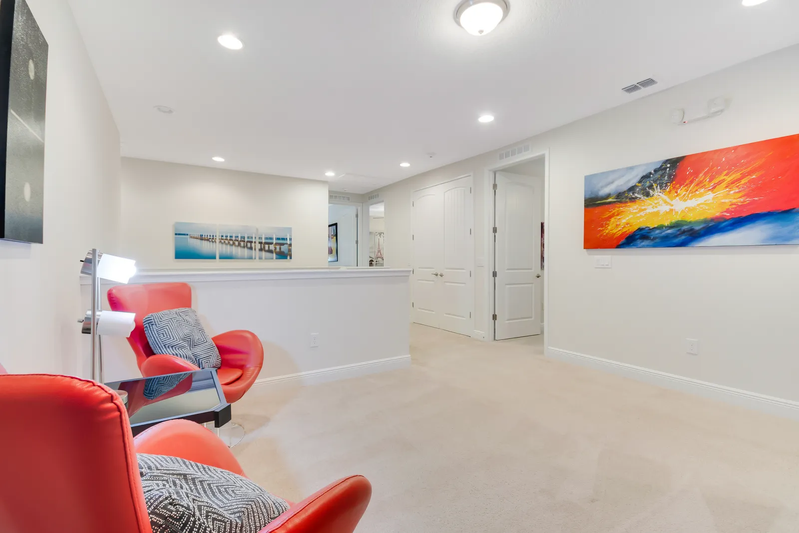 Upper loft lounge with accent chairs